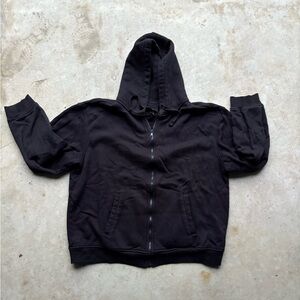 H&M Black zip-up hoodie with a relaxed fit
